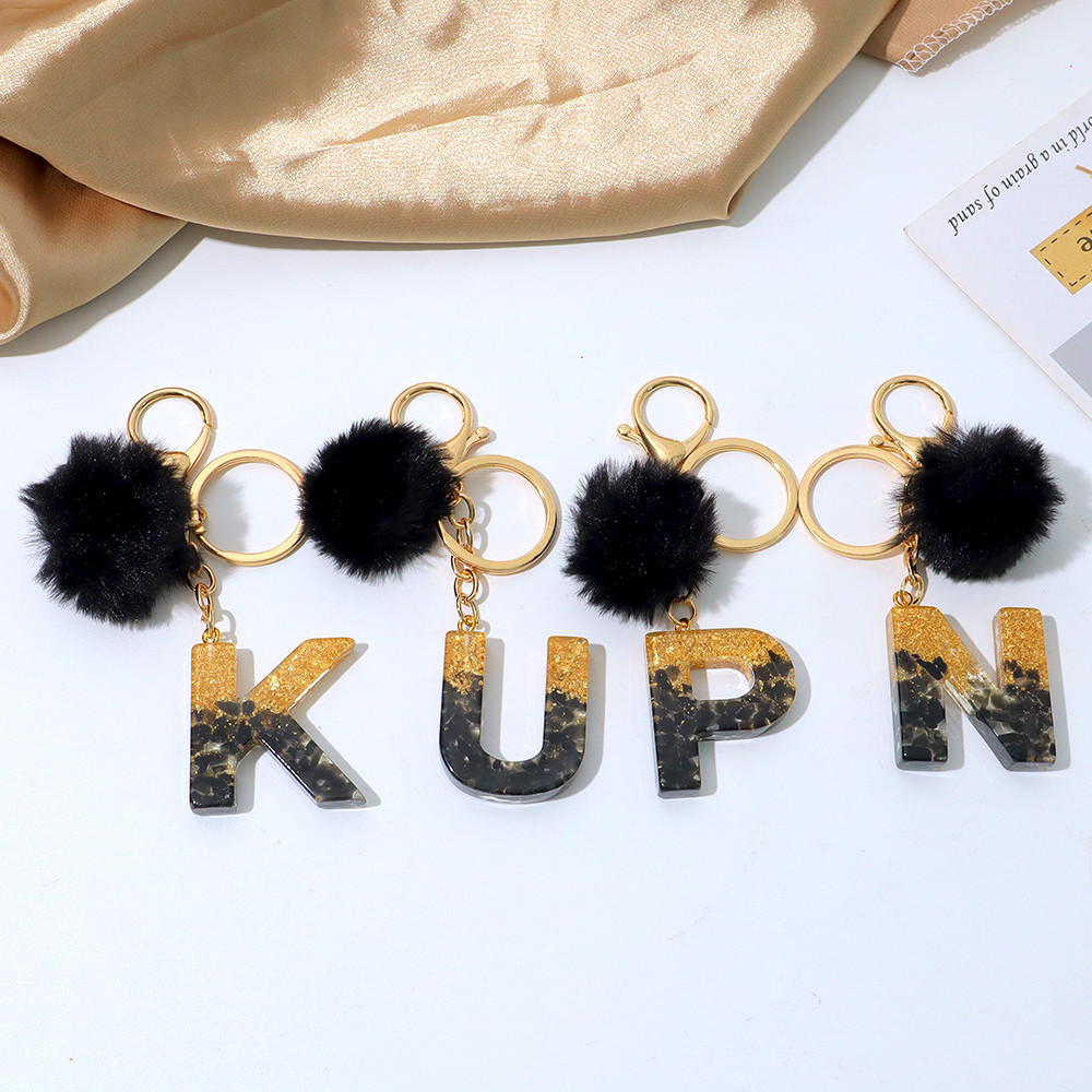 Niedlicher Schwarzer Pompon A- – Resin Art Alphabet Bewertung und Preis